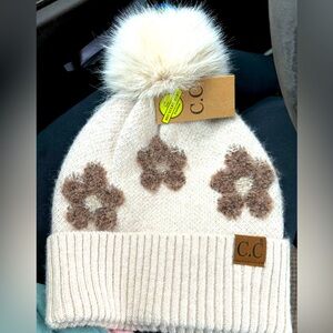 Woman’s CC Winter Beanie with Poof Pom